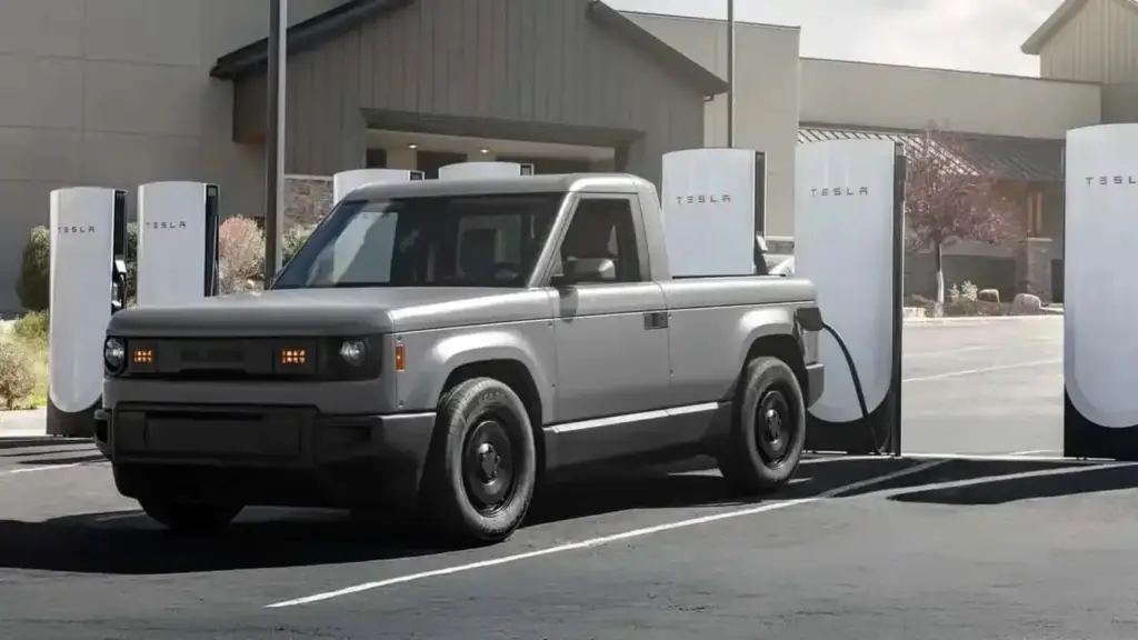 Vista frontal del coche eléctrico de Bezos, modelo económico de Slate Auto, diseño minimalista y carrocería compacta