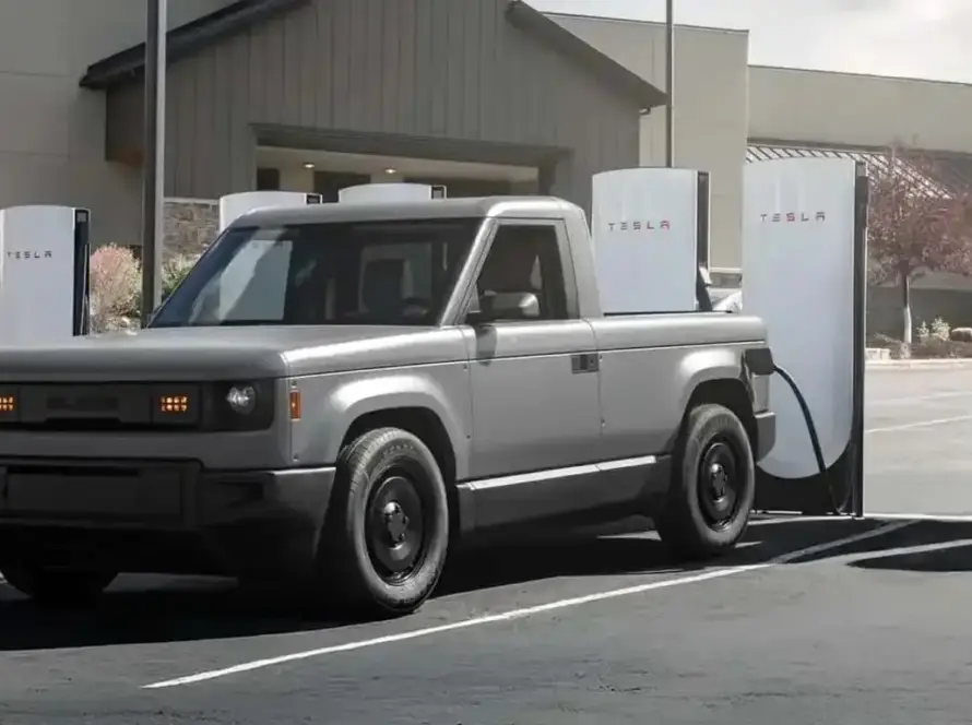Vista frontal del coche eléctrico de Bezos, modelo económico de Slate Auto, diseño minimalista y carrocería compacta